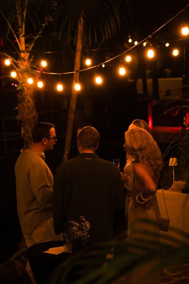 The bar and terrace lit in the evening