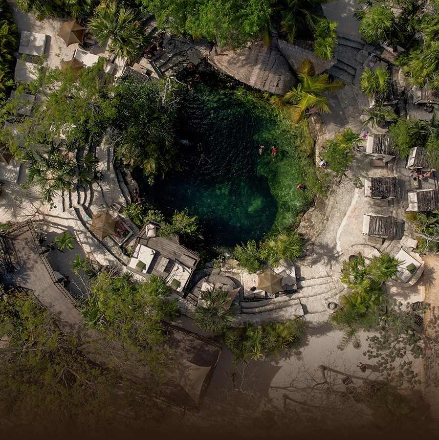 Aerial view of the cenote and its decks at Cenote Vesica, Tulum