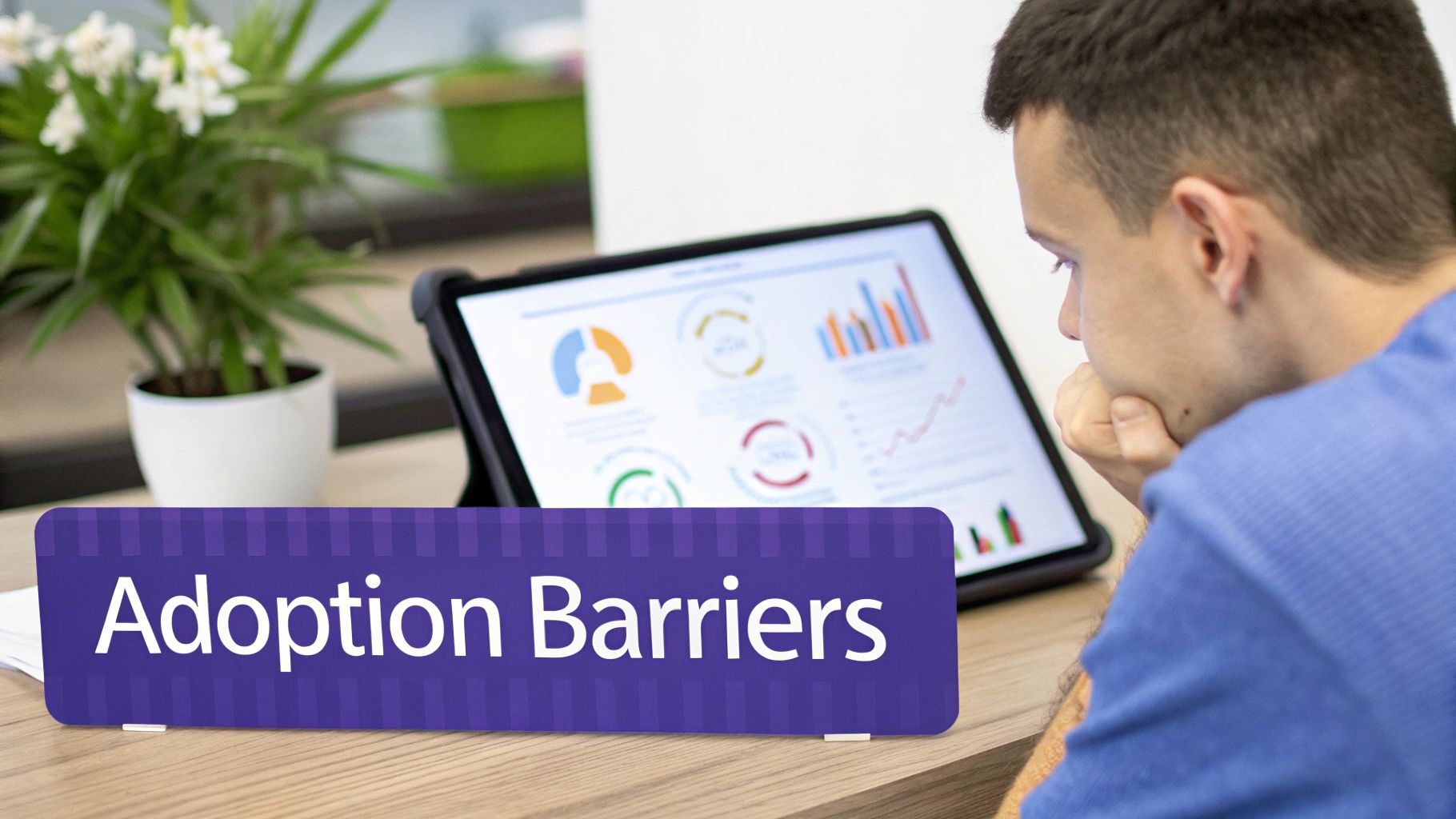 A man contemplates a tablet displaying data charts and graphs, with an 'Adoption Barriers' sign.