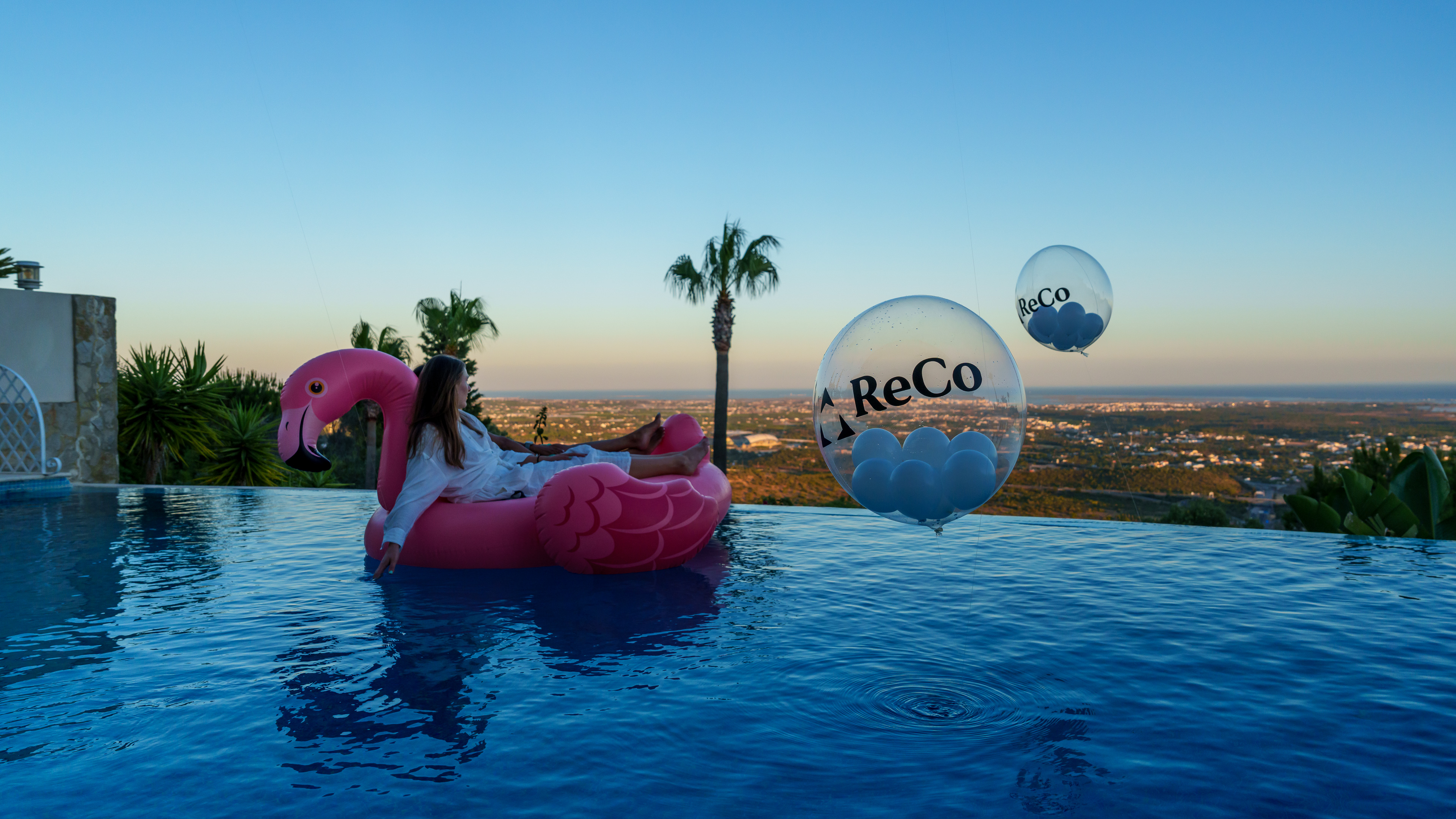 An infinity pool with a gorgeous backdrop of the algarve coast