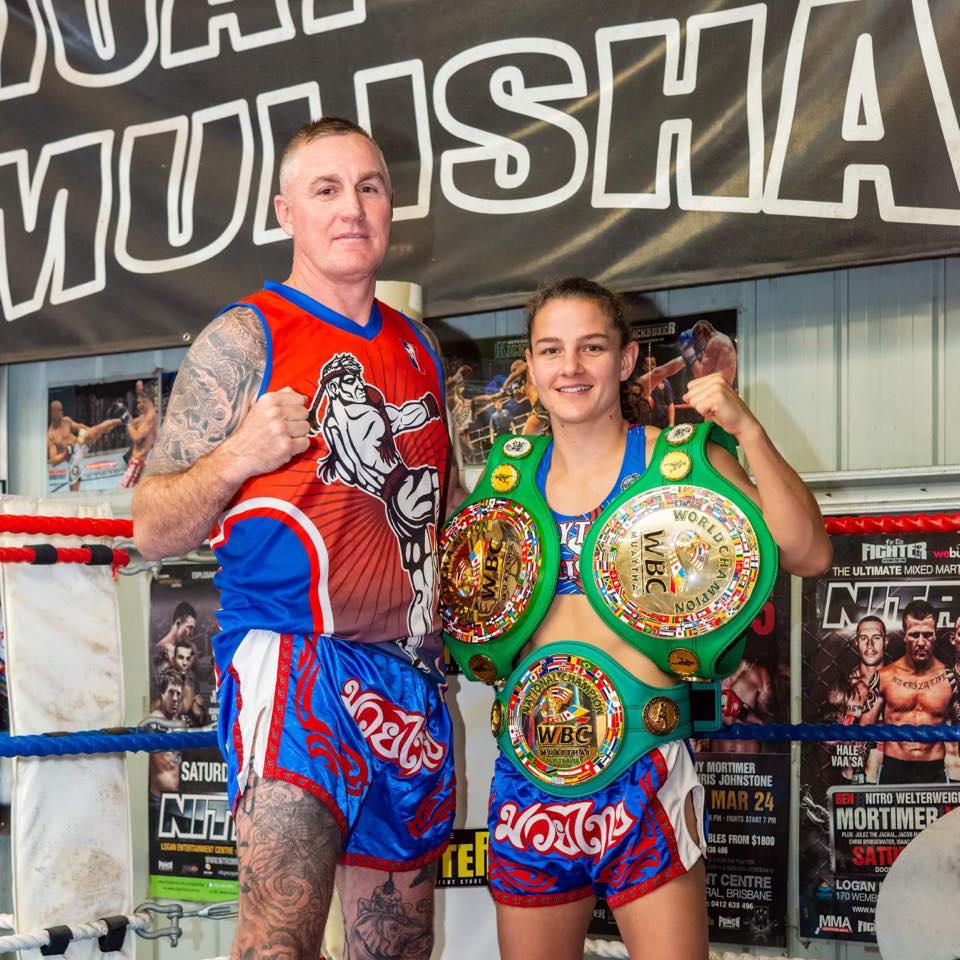 muay thai athlete fighting on the ring