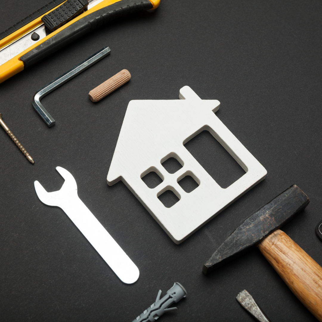 Rental property owner reviewing a maintenance and expense budget