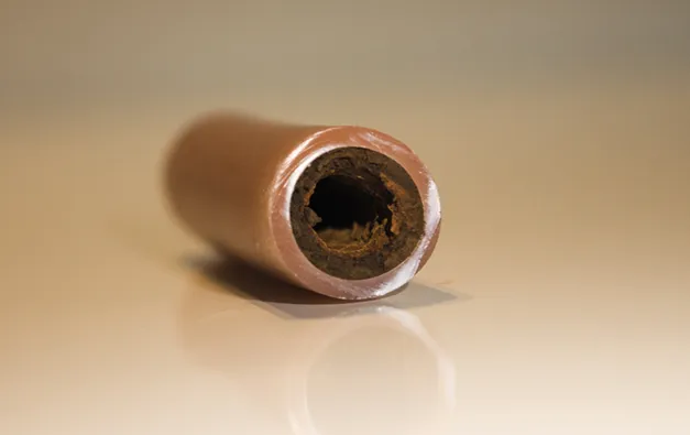 A close up of a tube on a table.