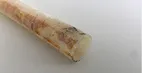 A banana that is sitting on a table.