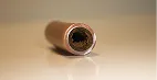 A close up of a tube on a table.