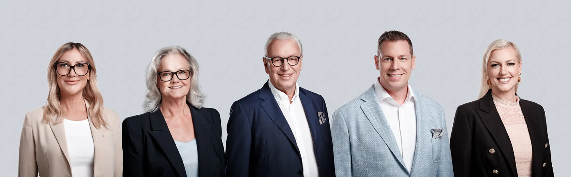A group of people standing next to each other.