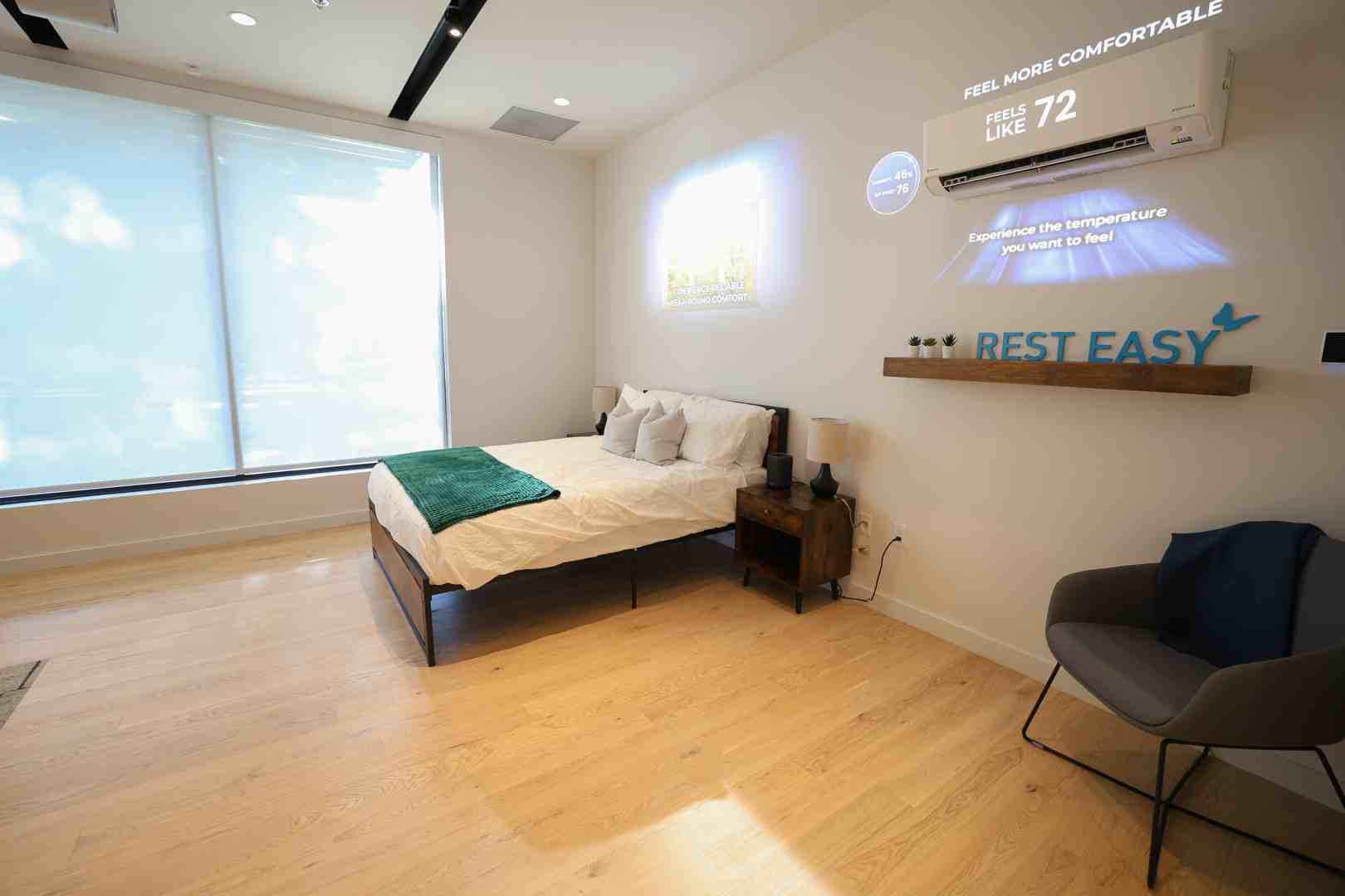 happy family enjoying a comfortable room temperature thanks to their mini split - ductless mini split installation seattle wa happy family enjoying a comfortable room temperature thanks to their mini split - ductless mini split installation seattle wa