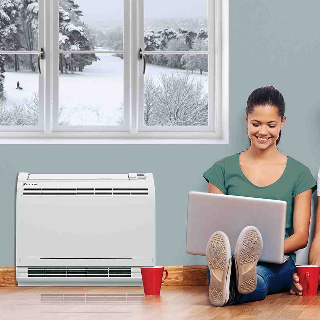 family enjoying comfortable living room - heat pumps inspection in medina wa family enjoying comfortable living room - heat pumps inspection in medina wa