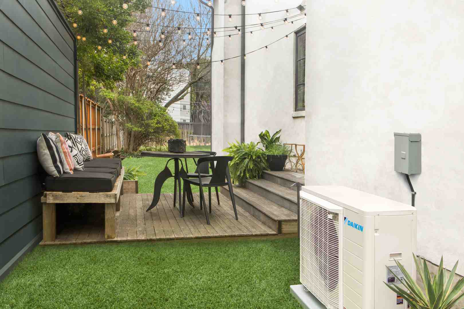 Daikin Fit outdoor unit installed in a clean residential setting - how daikin inverter systems run quieter than traditional Daikin Fit outdoor unit installed in a clean residential setting - how daikin inverter systems run quieter than traditional