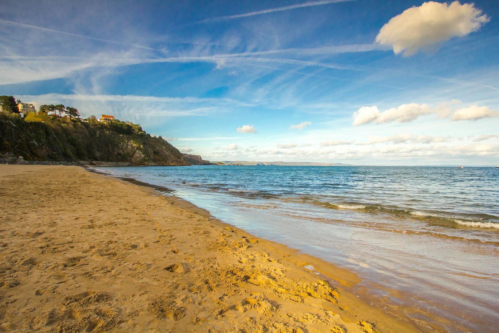 Golden sand beach with rocky headland on the undeveloped Akamas Peninsula coast