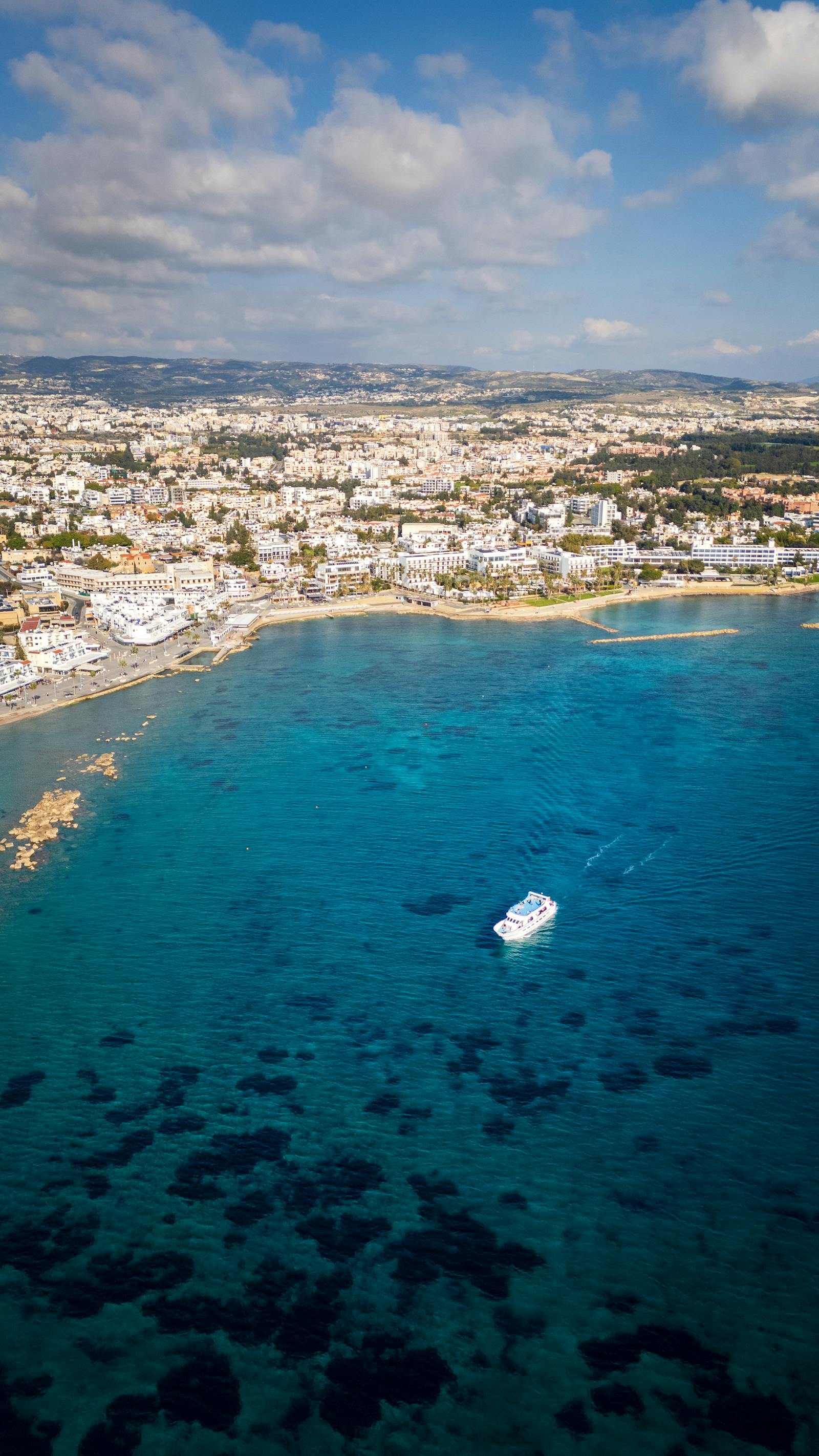 Aerial view of the Paphos coastline and turquoise Mediterranean sea in Cyprus