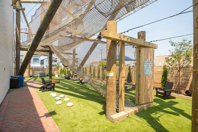 Outdoor rope climbing net at The Yard adventure park in Ocean City, NJ