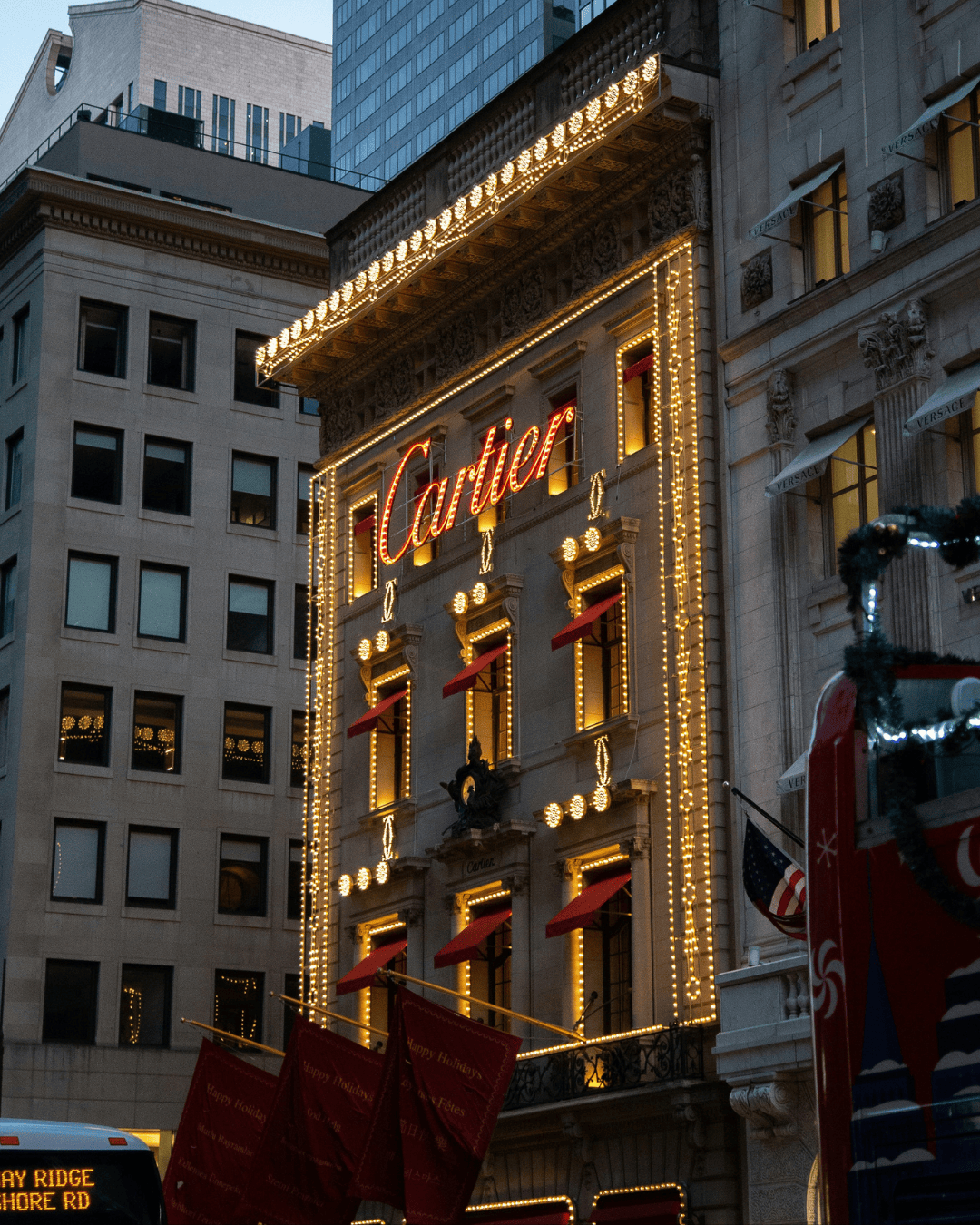 Urban scene around Hotel Hugo, with bustling streets and diverse architecture.