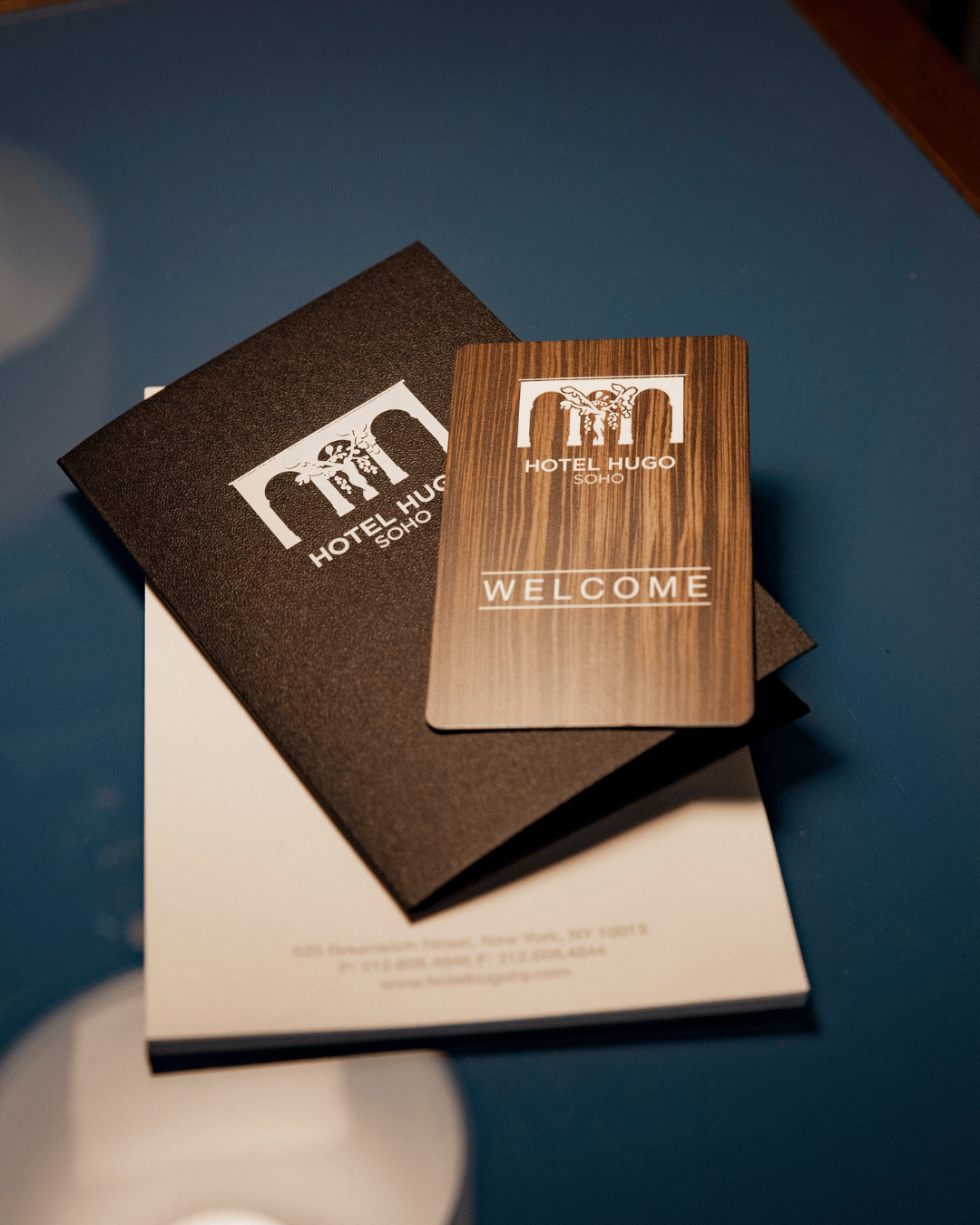 Welcome sign at Hotel Hugo SoHo NYC greeting guests with boutique style and warm ambiance