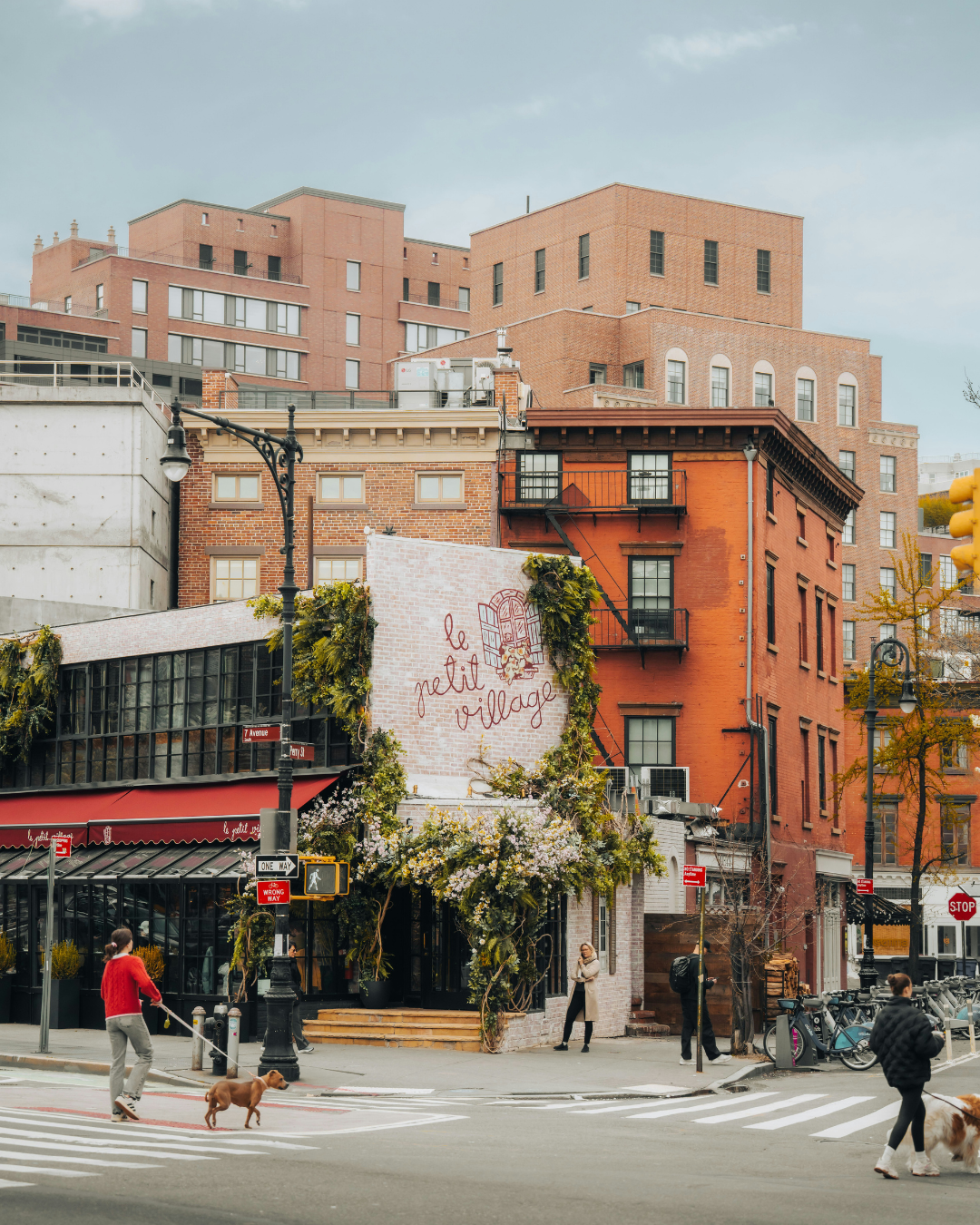 Urban scene around Hotel Hugo, with bustling streets and diverse architecture.