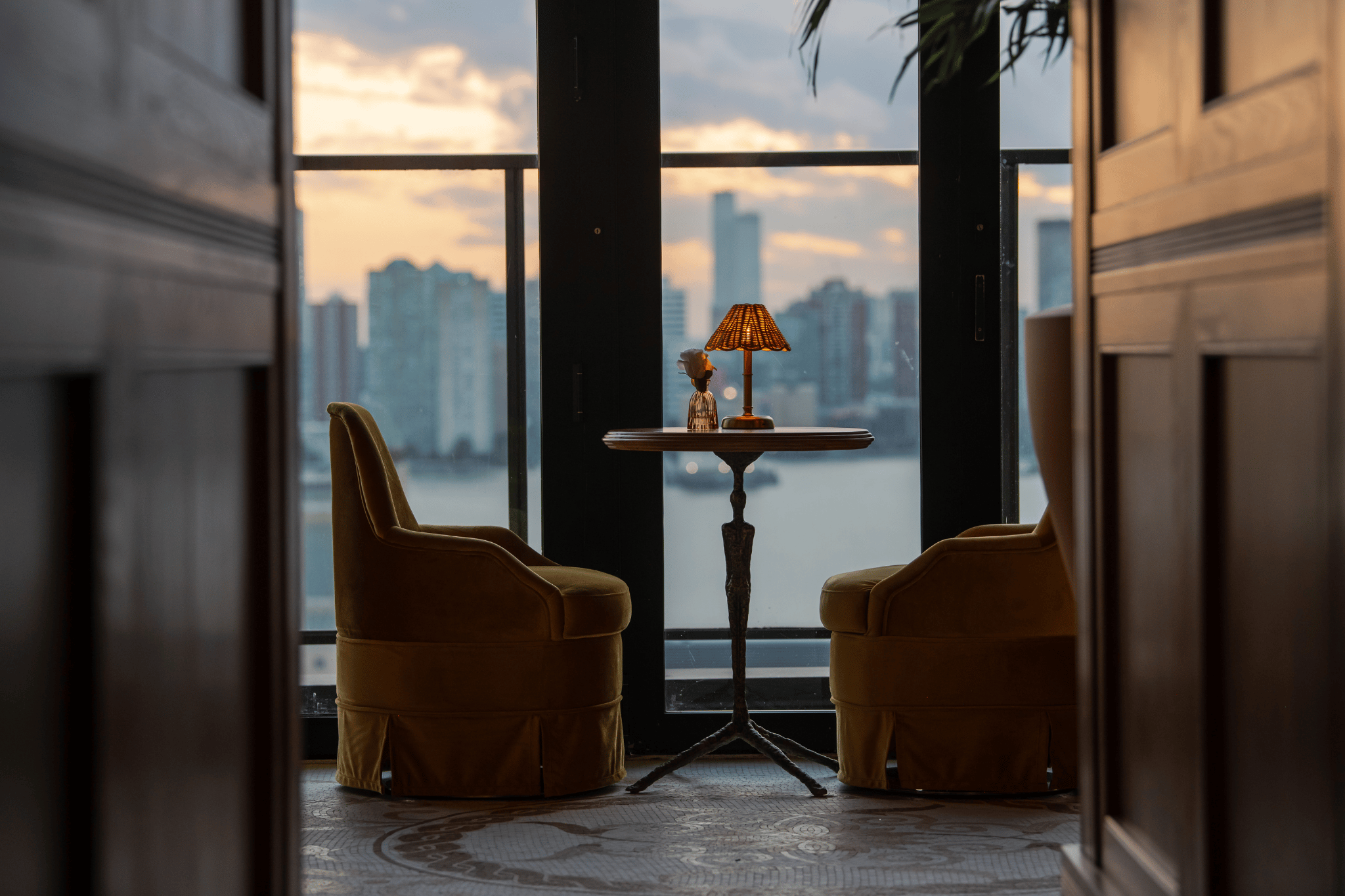 Rooftop Hugo Bar with elegant seating and warm lighting.