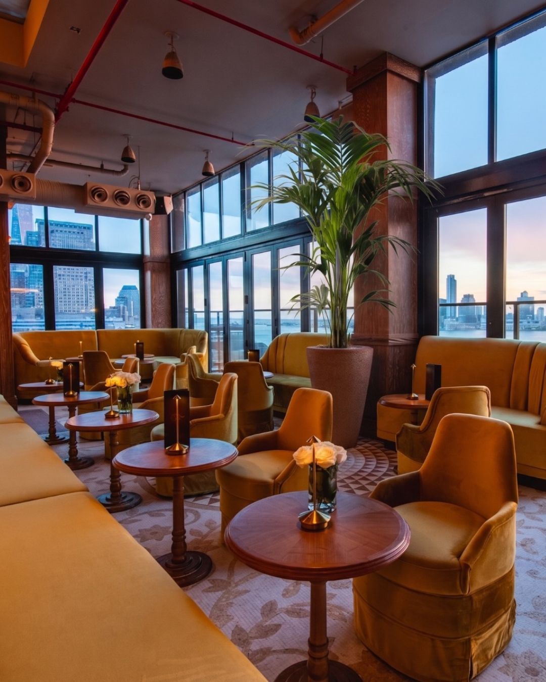 Bar Hugo NYC Instagram post featuring rooftop views of Manhattan