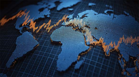 Continents on a globe with a line graph indicating the state of the economy