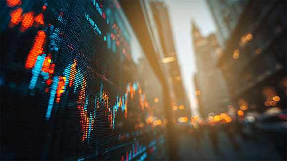 A digital stock market graph that blends with downtown New York City 