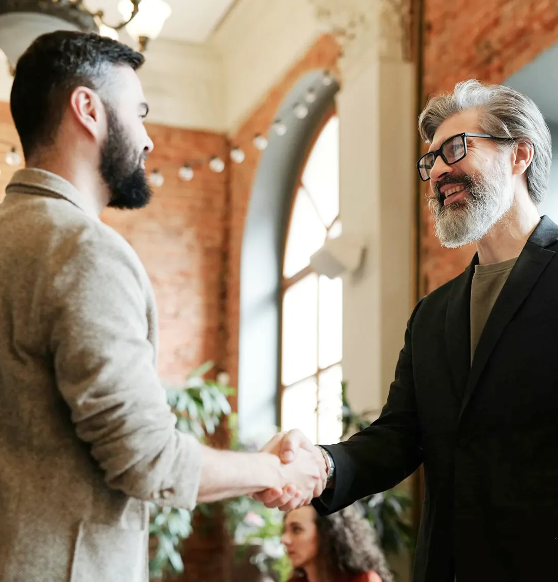 Two men greeting each other