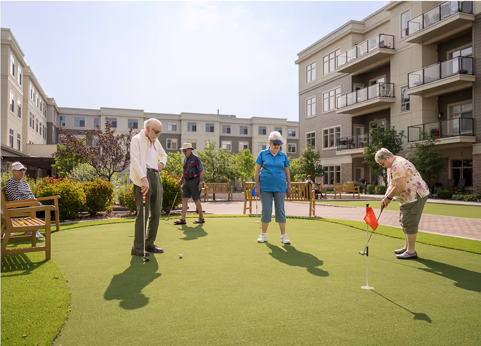 seniors on a putting green in retirement community in calgary fish creek