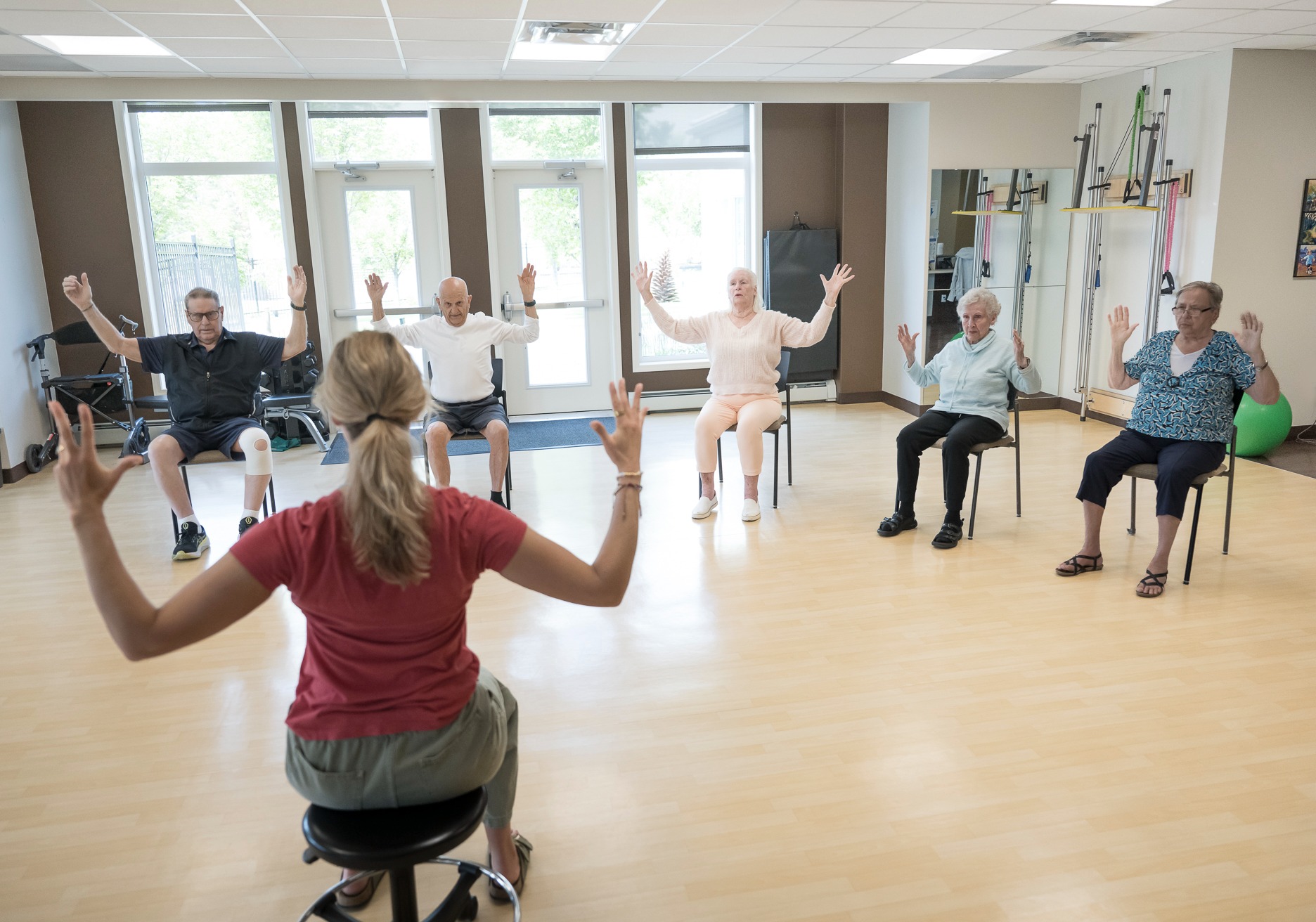 group of seniors engaging in physical programs at retirement community