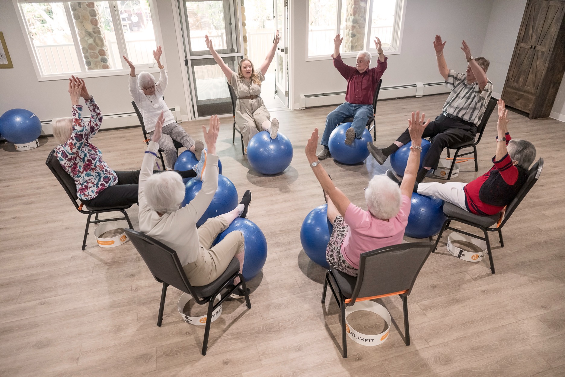 group of seniors engaging in retirement living excercise programming