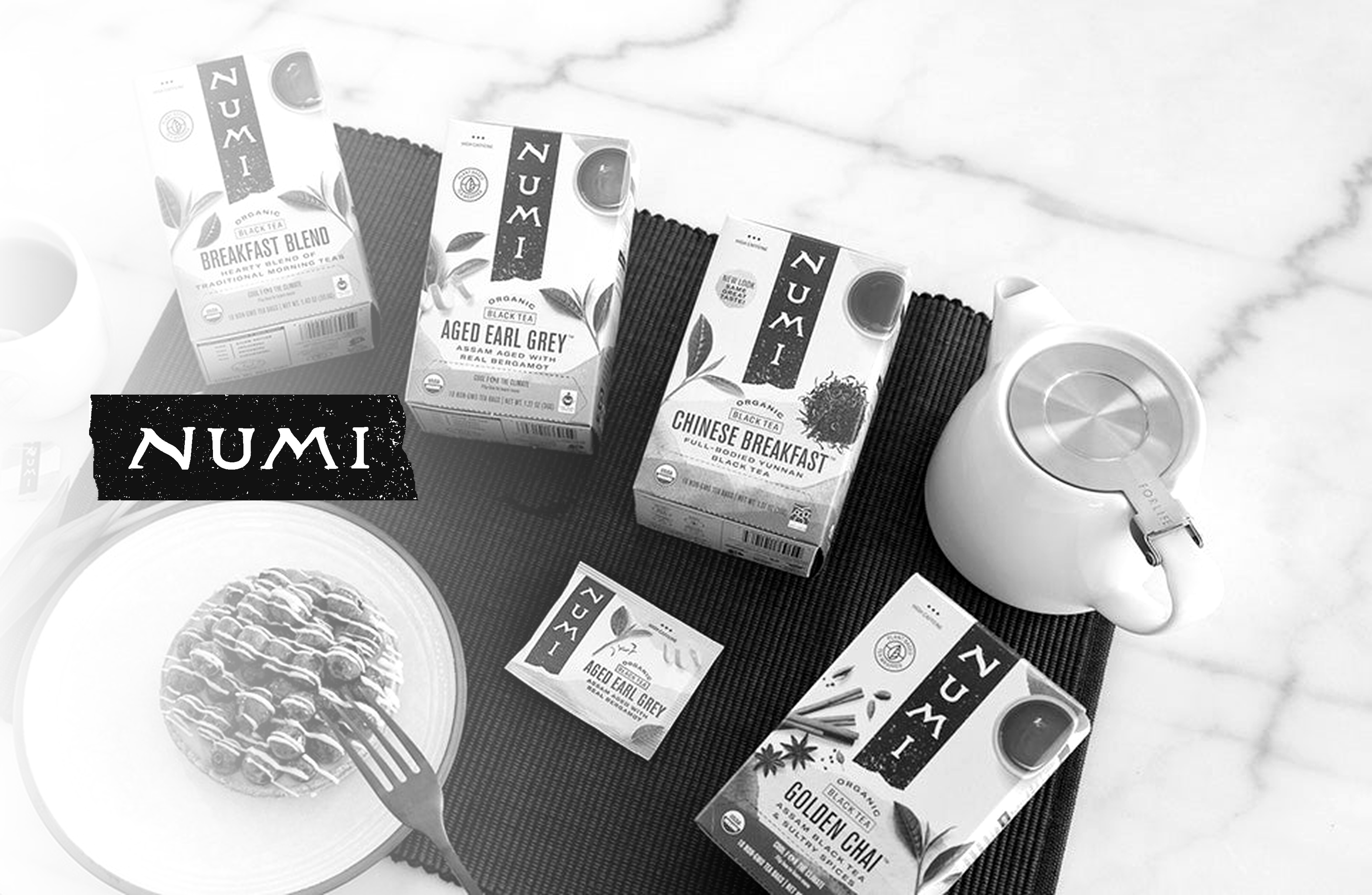 Numi Organic Tea teas with the Numi logo