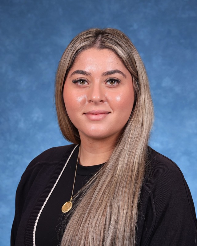 Professional headshot of staff member Emona Maqelara