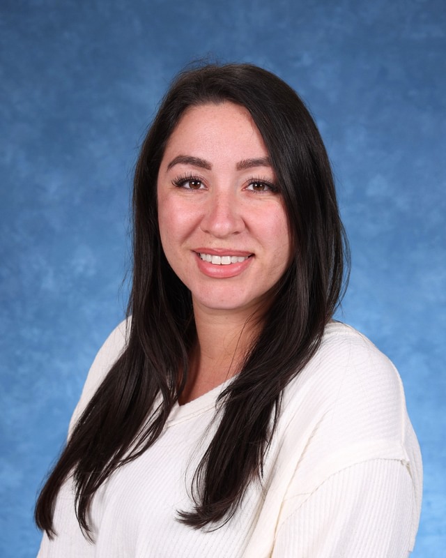 Professional headshot of staff member Lauren Vitale
