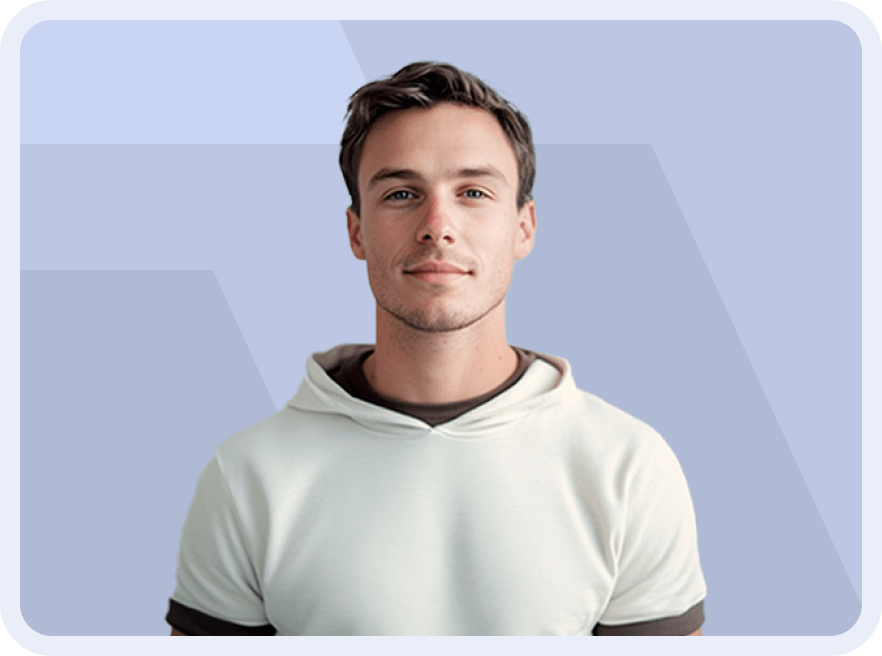 A man in a hoodie is looking at the camera.