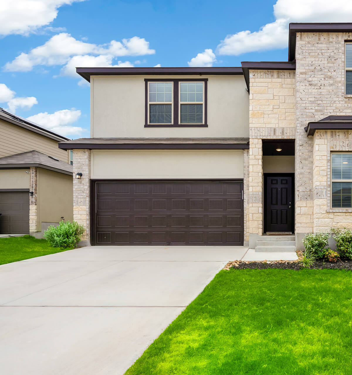 New modern garage door installed by Hayden Garage Doors.