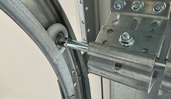 Garage door track and roller maintenance.
