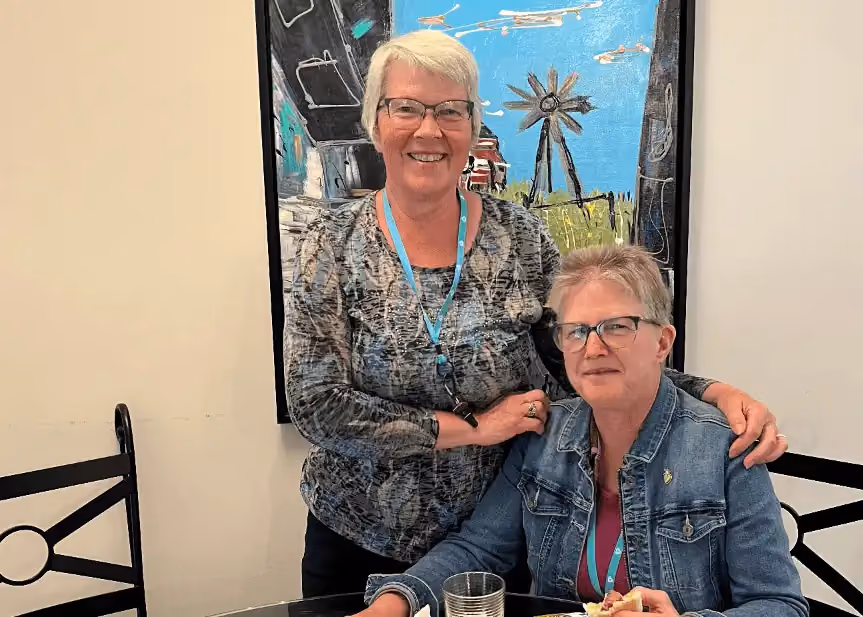 two compassion house women in common room