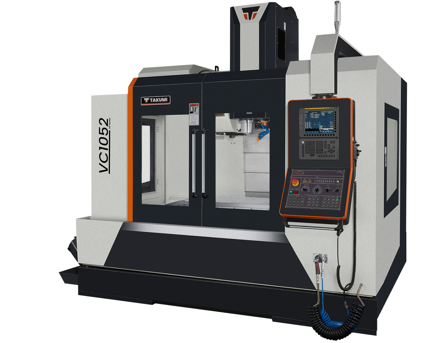 Takumi VC1052 CNC machining center with tool holders and control panel in an industrial workshop.