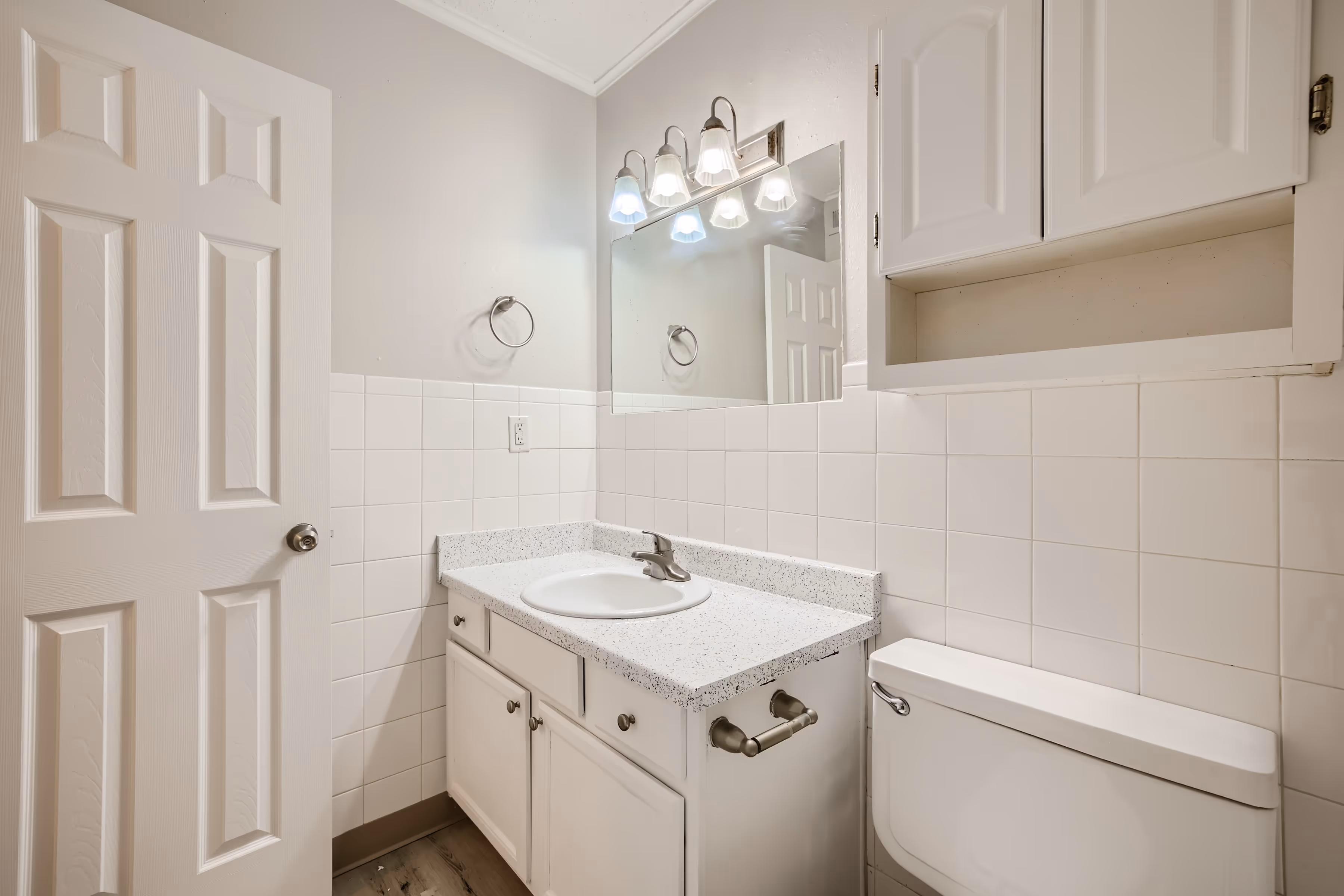 Updated bathroom with white vanity