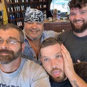 Drew, Skylar, and Trystan Vinson and the boy's Godfather EC Haynes.