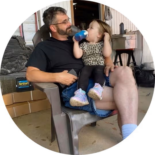 Drew Vinson with his Grand-daughter.