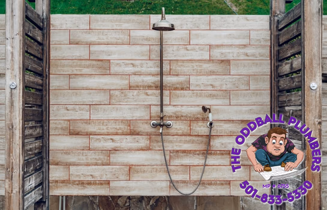 Outdoor shower install with tiling.
