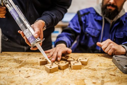 Man writes in to the book in office