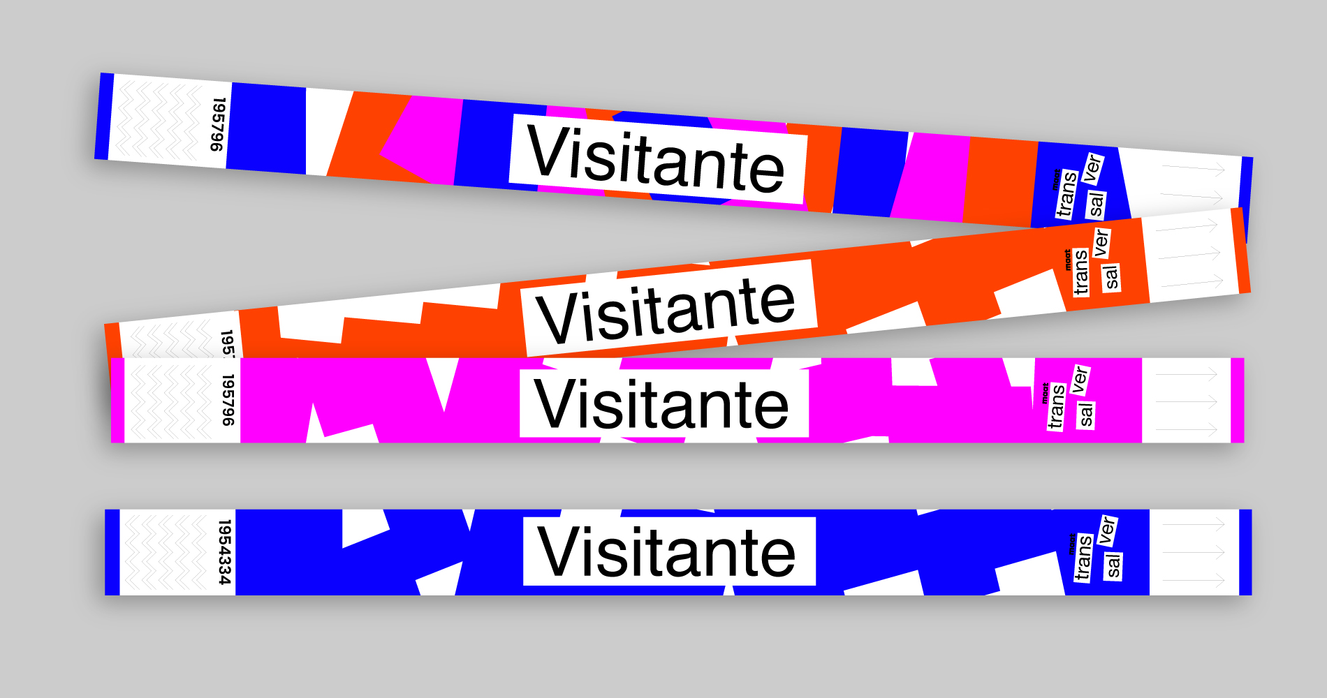 Four multicolored wristbands with the word 'Visitante' and various patterns and numbers on each.