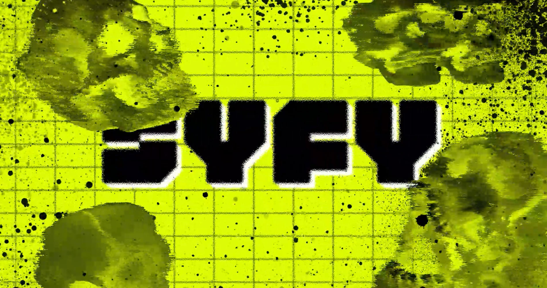 Black bold letters spelling 'SYFY' on a bright yellow grid background with dark green skull images and black ink splatters.
