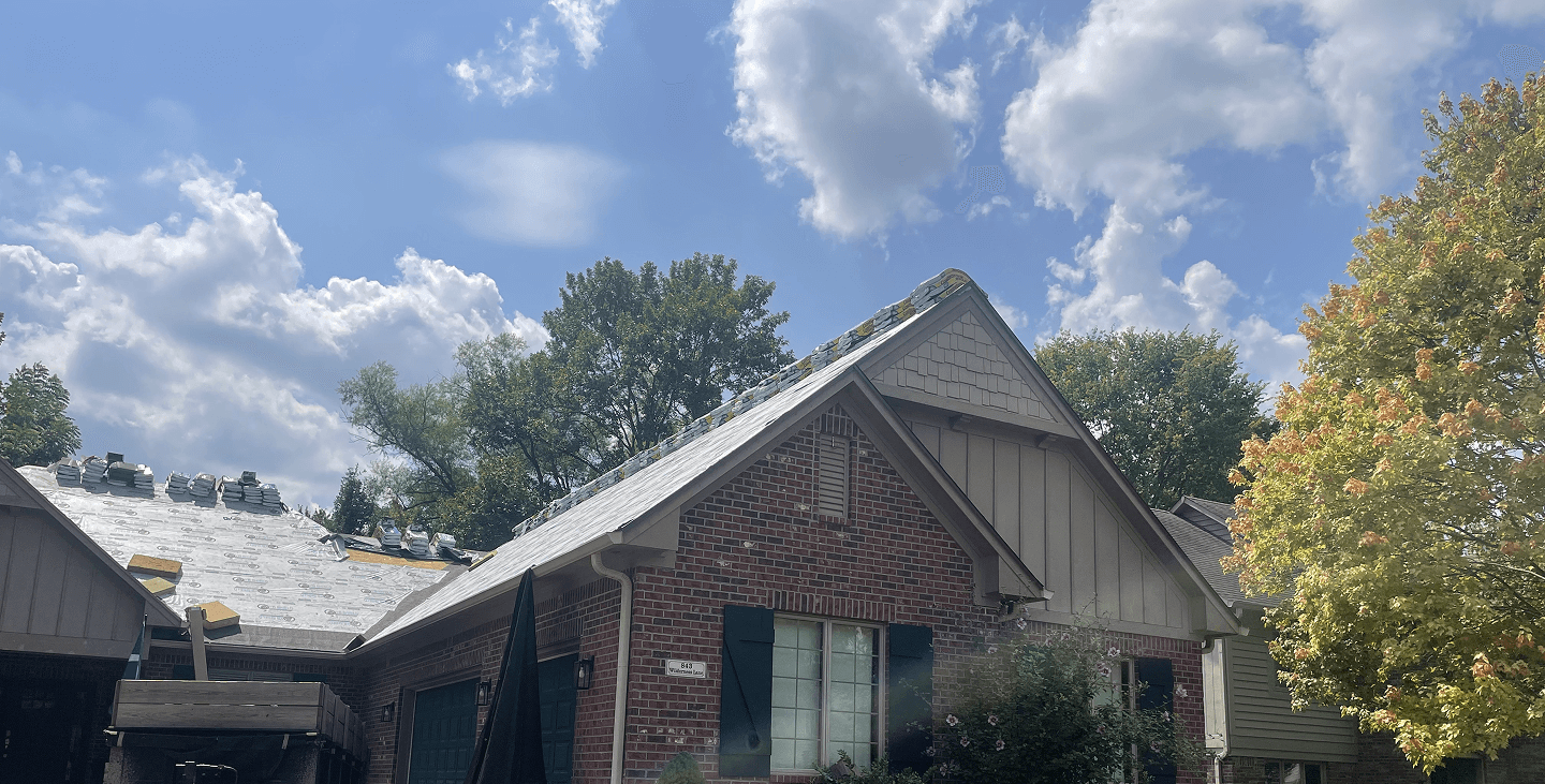 A house that Brothers Who Roof and Construction are repairing the roof on.