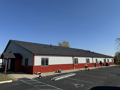 An after photo of a roof installation from Brothers Who Roof and Construction on a warehouse