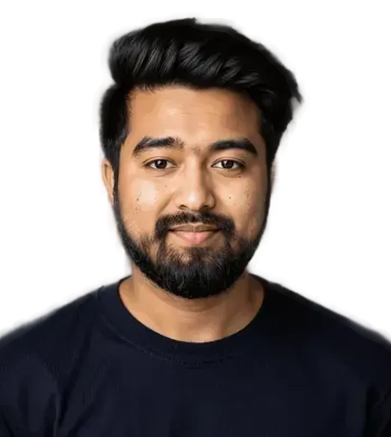 Portrait of a smiling young man with a beard and dark hair wearing a black shirt.