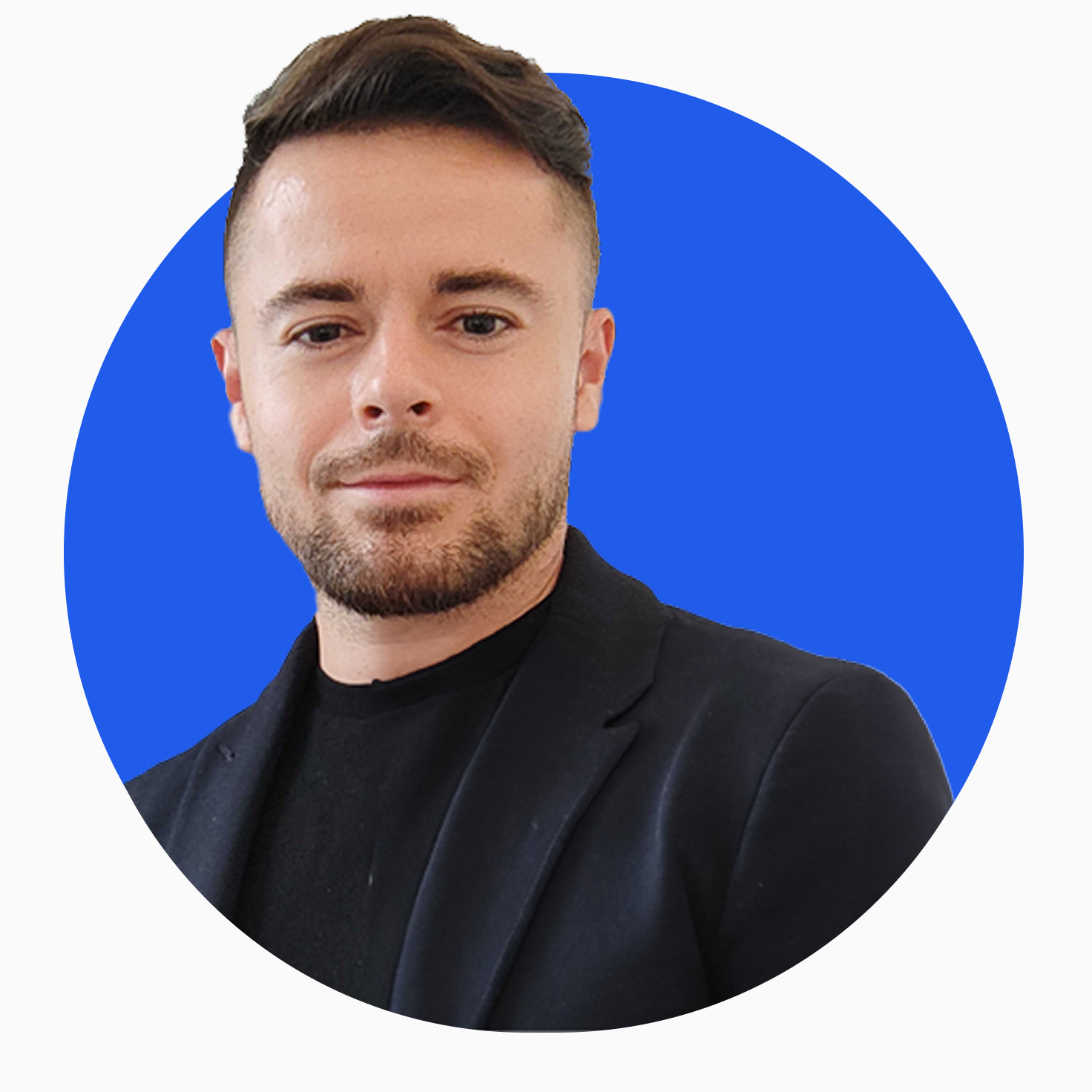 Portrait of a man with short brown hair and a trimmed beard wearing a black blazer and shirt against a blue circular background.