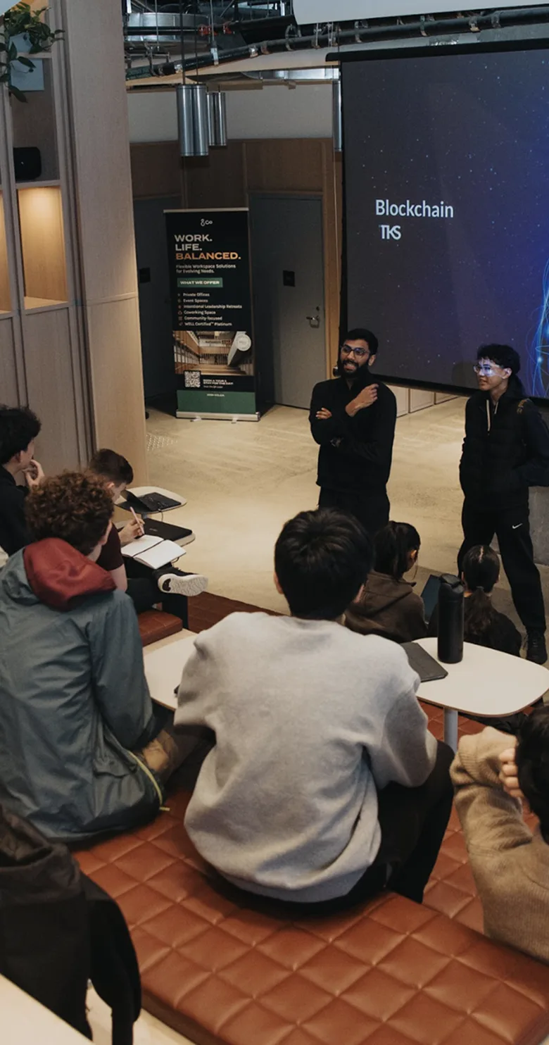 lecture in a large-screen auditorium