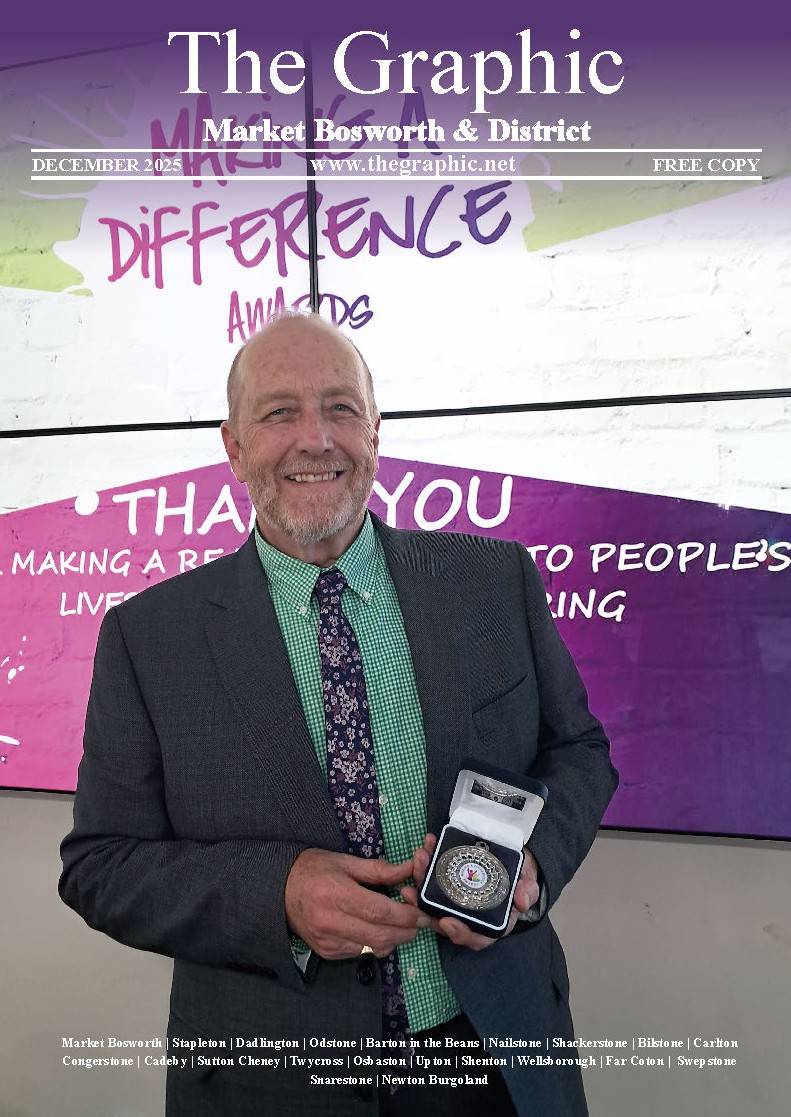 The Graphic Cover, Nigel Palmer accepting the 'Make a Difference Award'.
