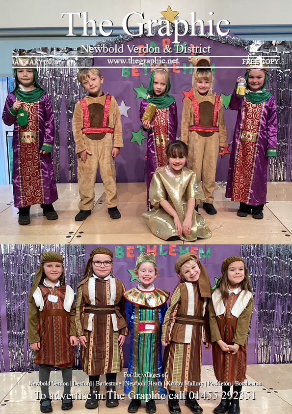 Children wearing Santa hats sitting with Santa Claus and Mrs. Claus inside a festive tent with a snowy winter backdrop.
