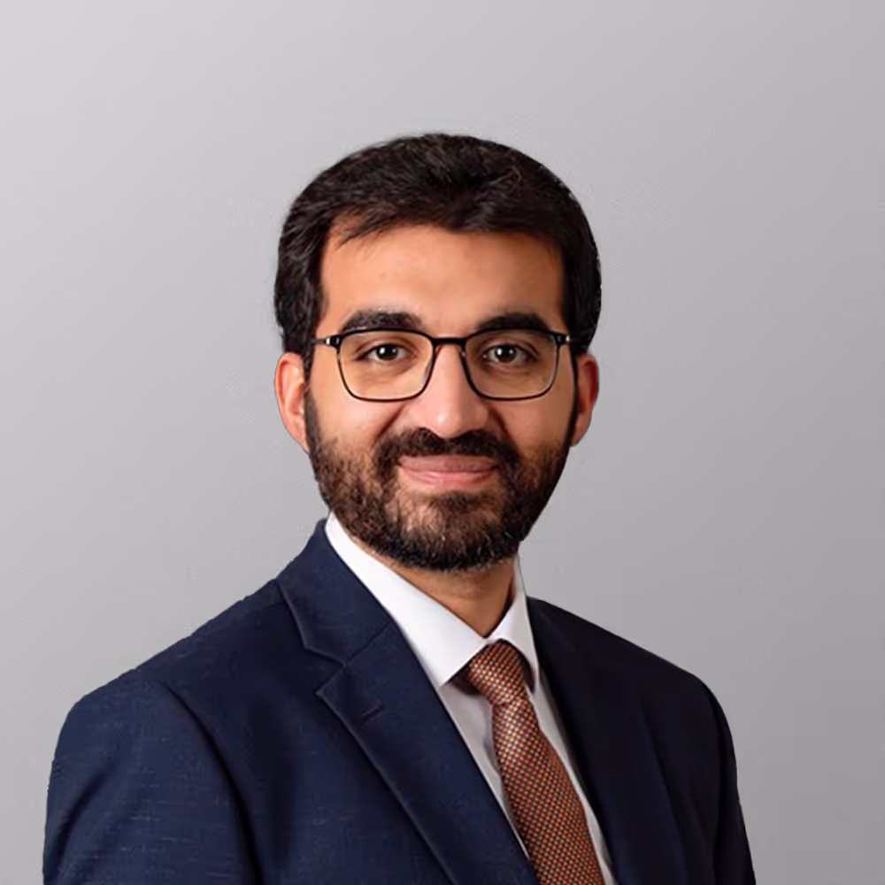 Team member profile picture and link to their profile